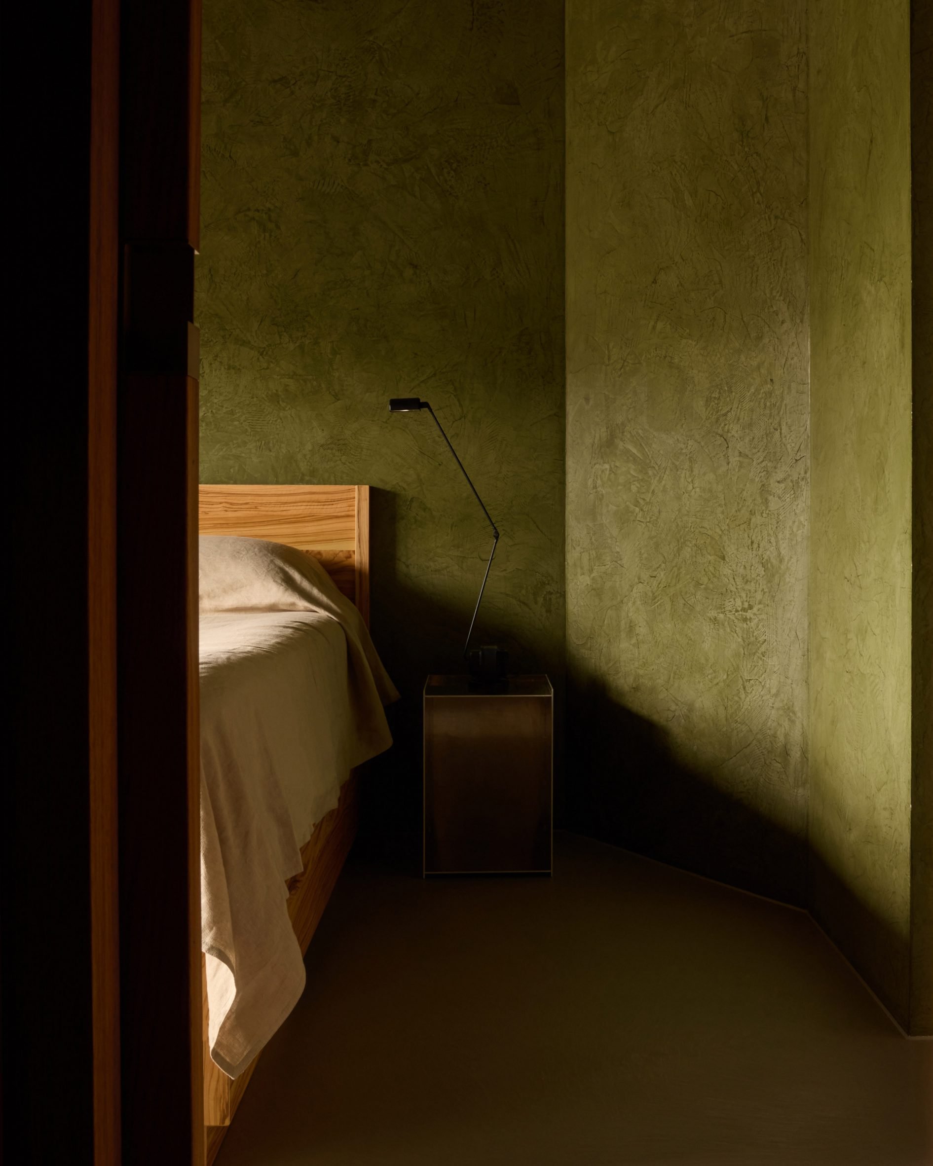 Bedroom with green wall