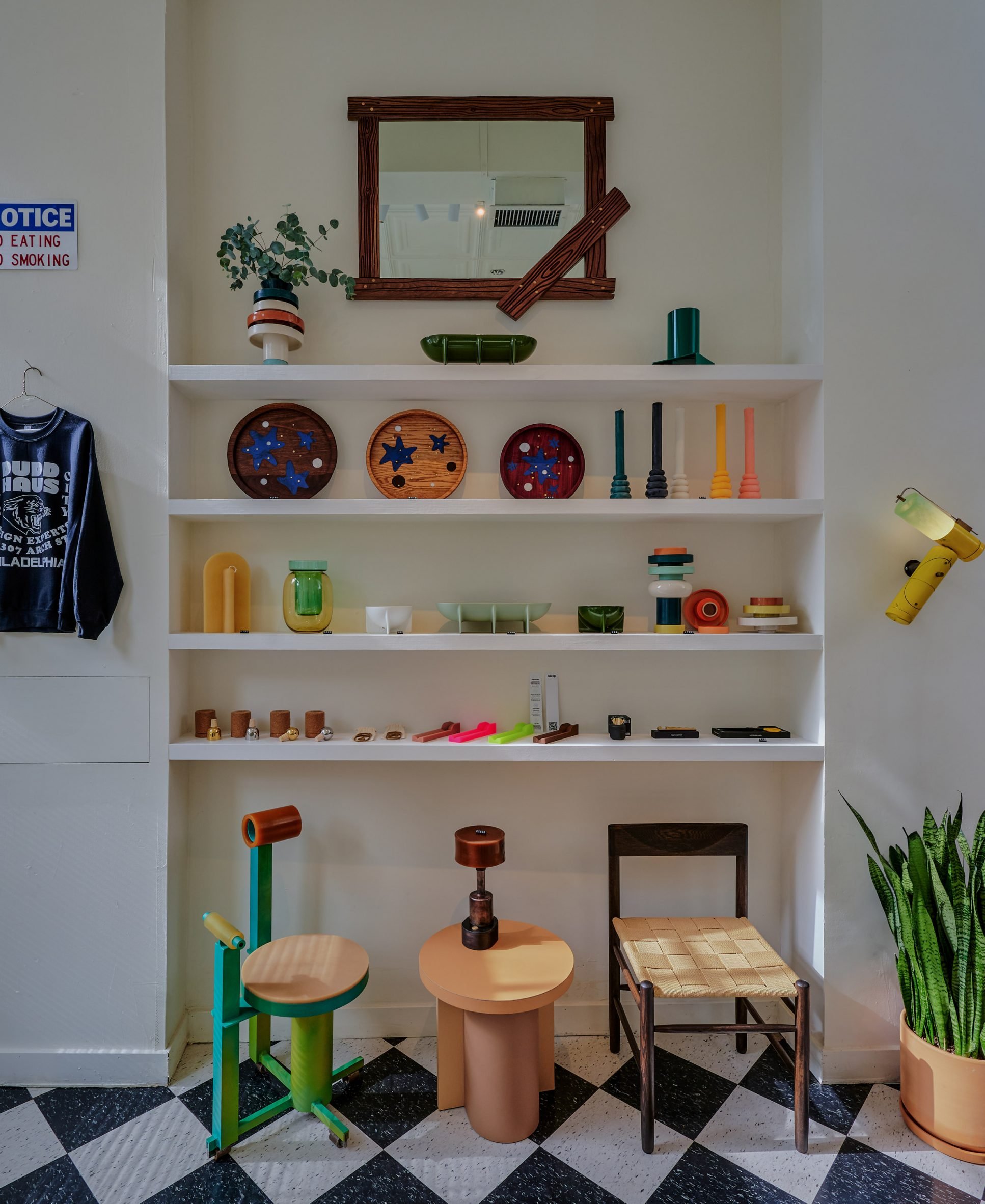 Display of seating and small objects on shelves