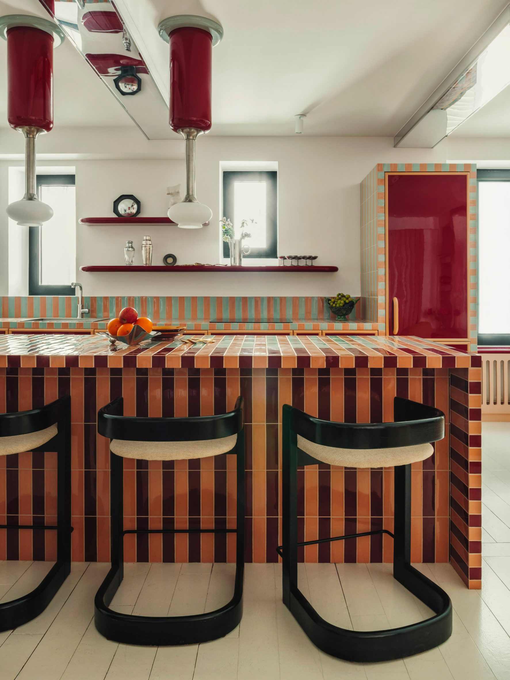 Kitchen with striped, tiled island and counters
