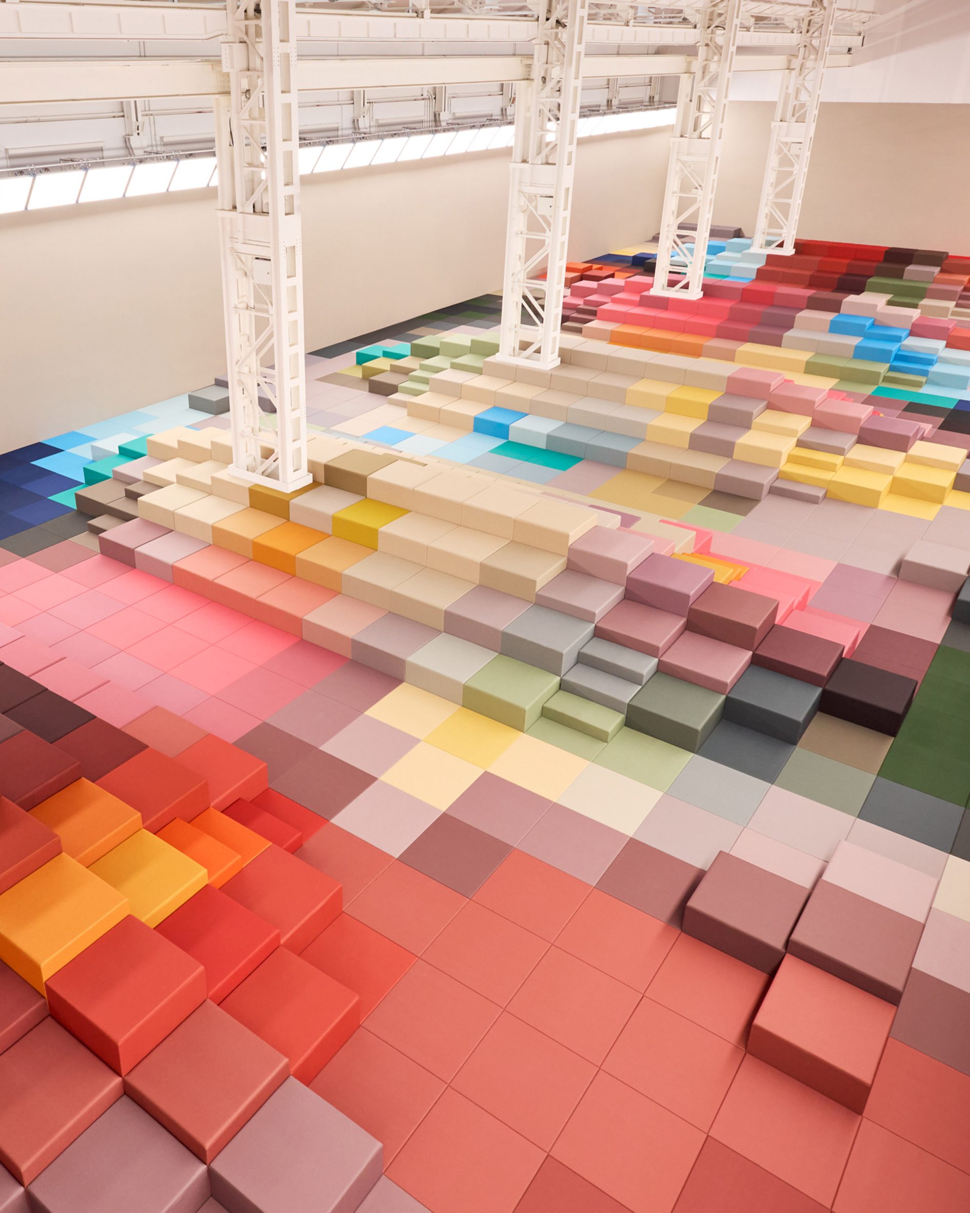 Overview of colourful blocks laid out in a room