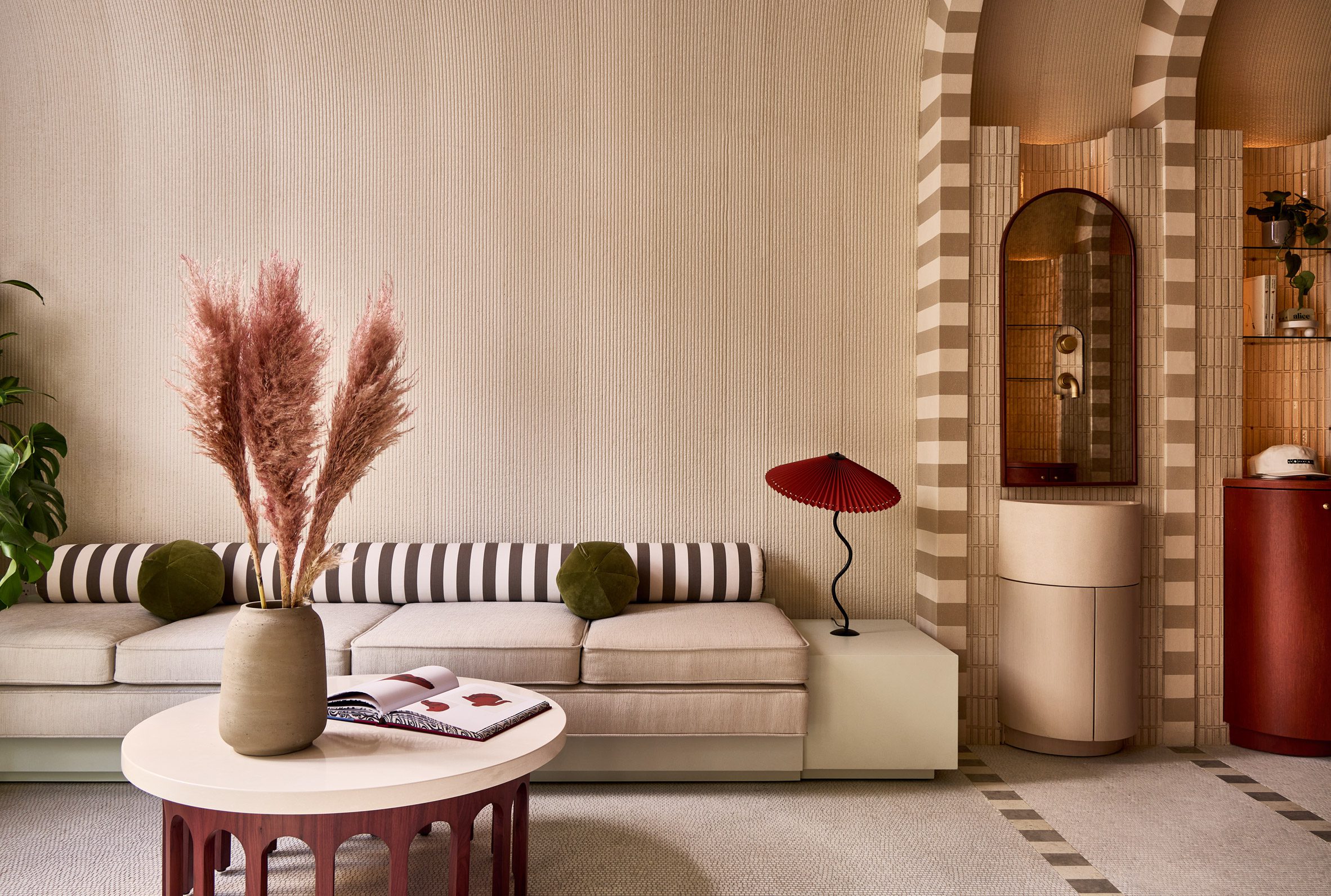 Lobby seating area with and earth-toned palette of textured materials