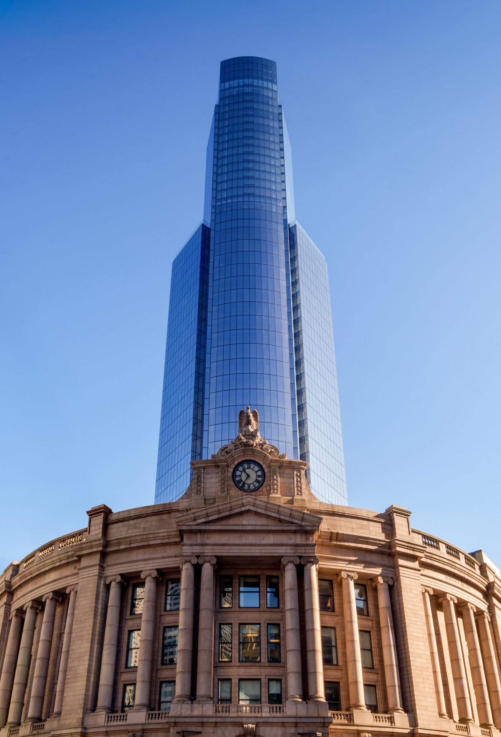 Neoclassical buidling with skyscraper above