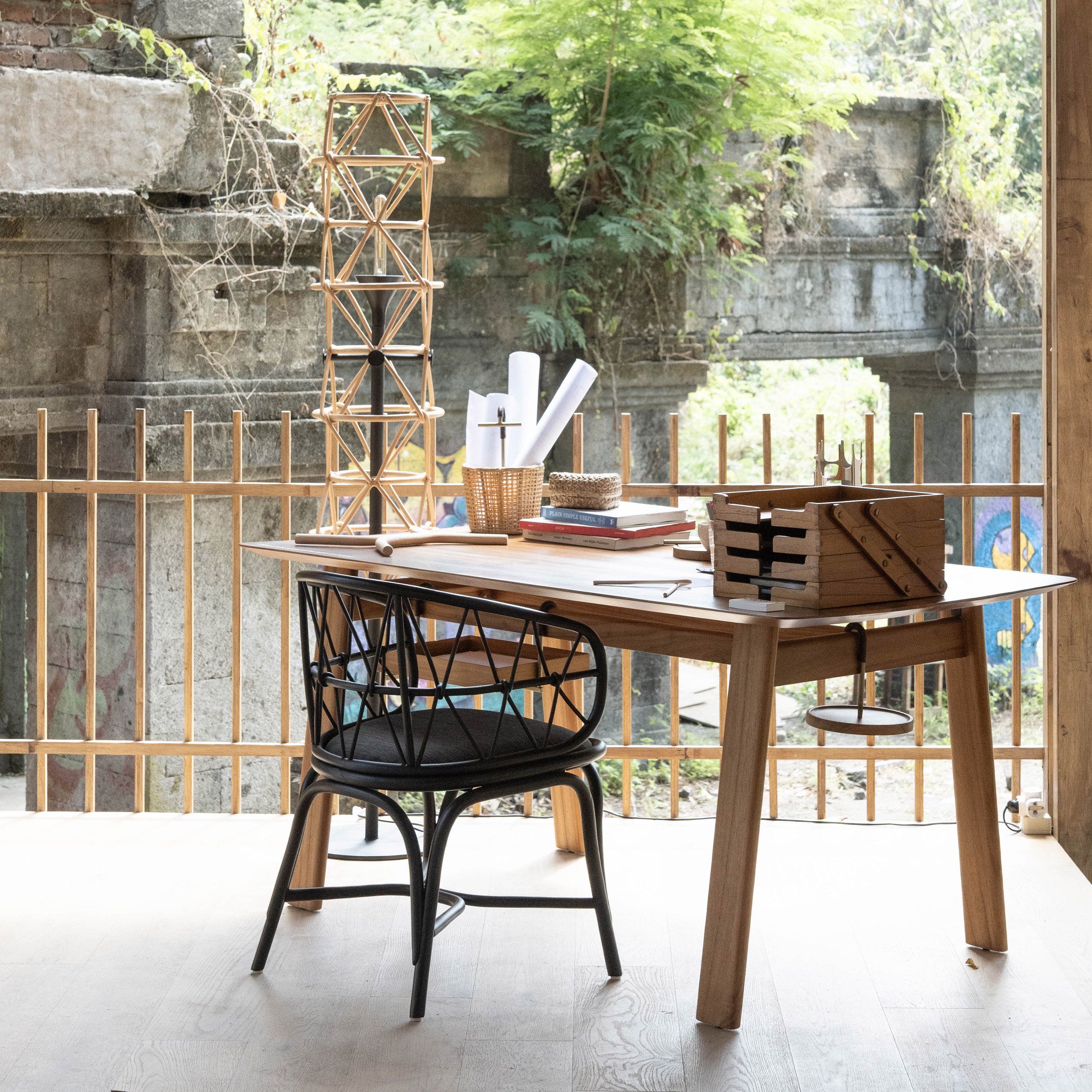 Simpul rattan chair and floor lamp by Felix Sidharta of Cassia