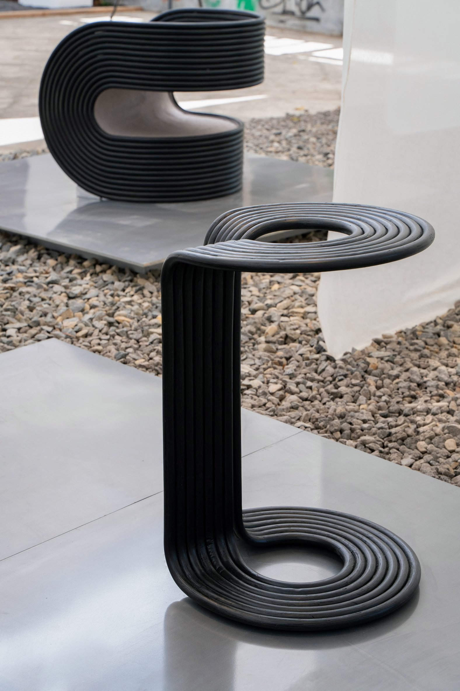 Rotella rattan chair and side table by Pietro Franceschini at Jia Curated