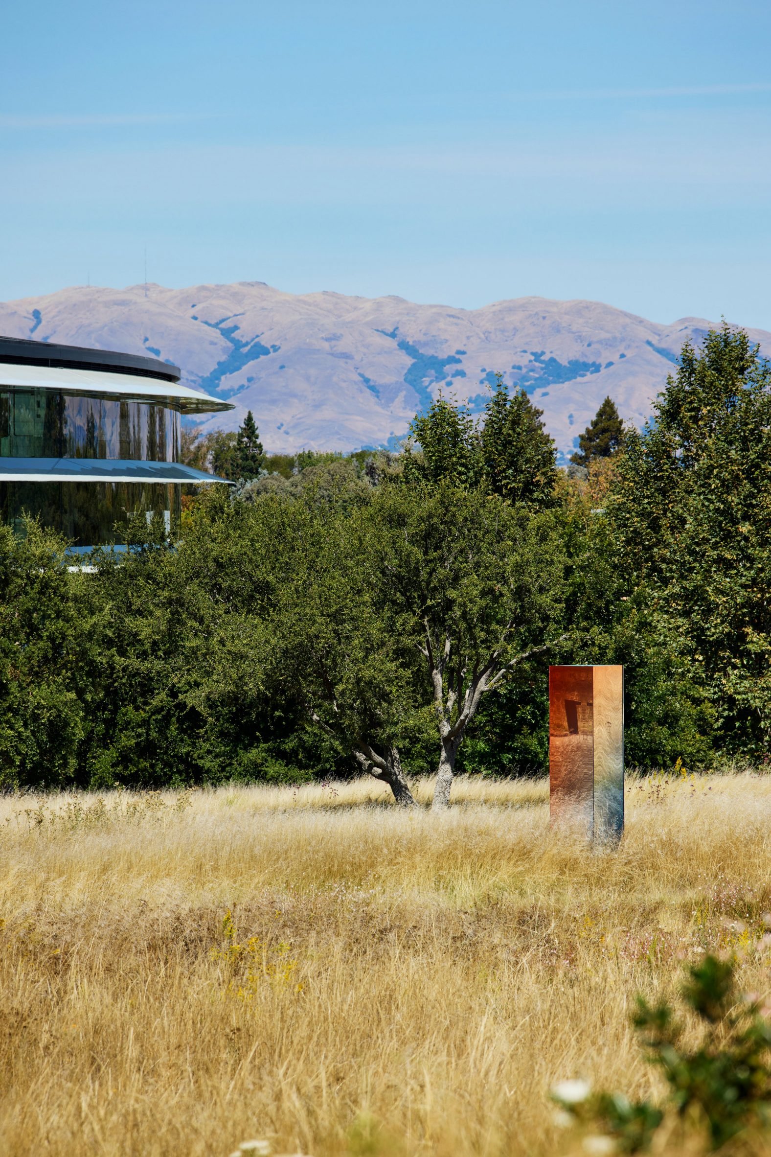 Dutch designer Sabine Marcelis has created a trio of mirrored and resin installations at Apple Park in California, all informed by the latest iPhones.