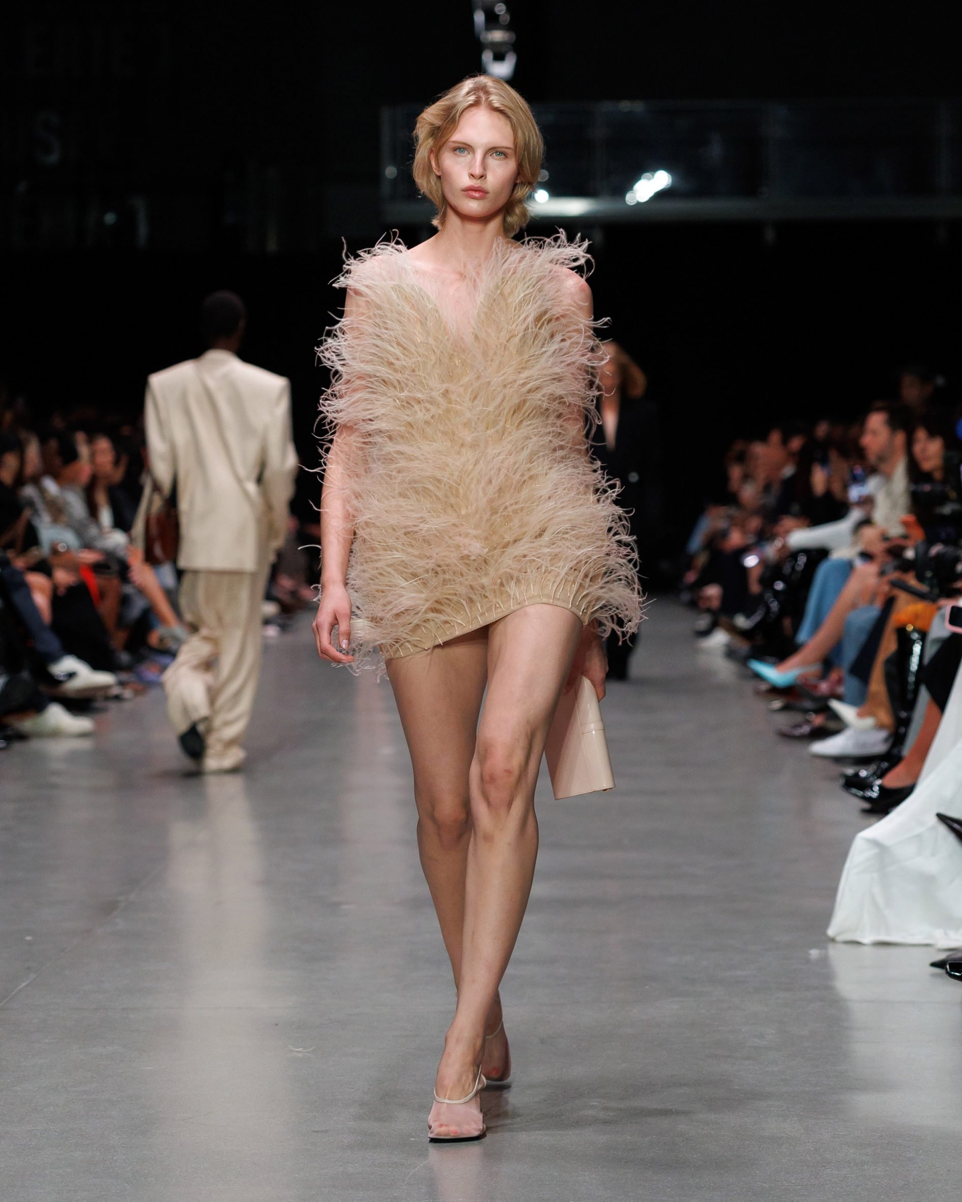 Nude mini dress covered in feathers